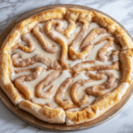 Delicious cinnamon-sugar pizza made with crescent rolls ready to be served.